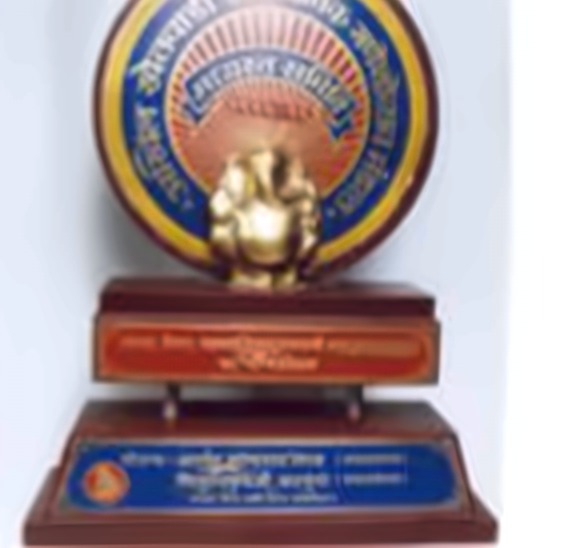 Gold Ganesh award shield won by Khetwadicha Raja